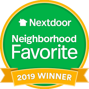 A green and gold badge with the text "Nextdoor Neighborhood Favorite 2019 Winner" and a house icon at the top. - Pure Salon Spa, KY